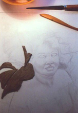 photo of sculpting a piece